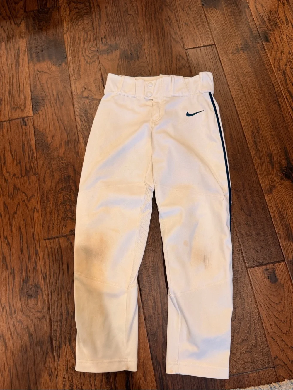 Nike White Kids Baseball Pants with Navy Swoosh and Side Stripe
